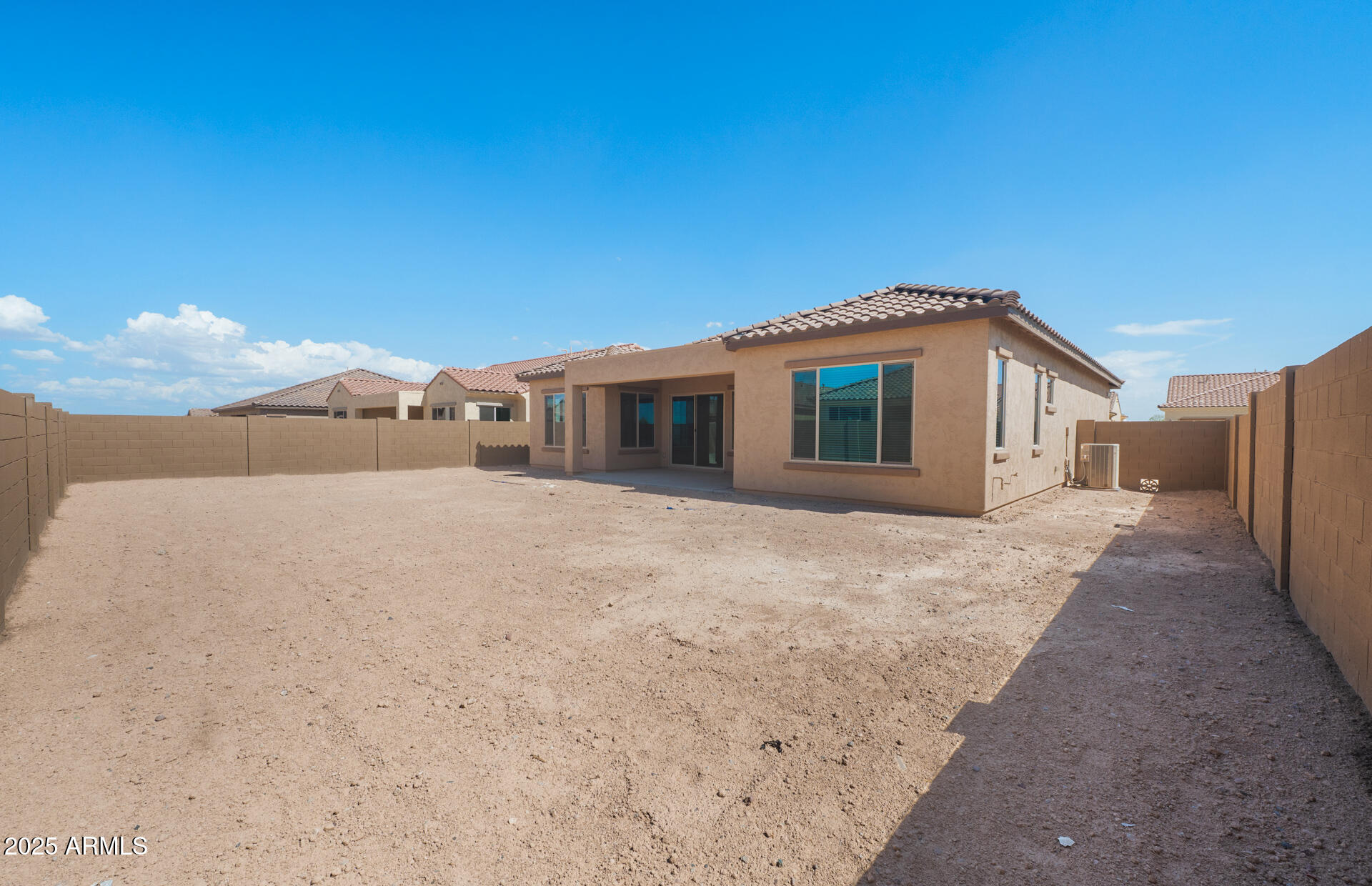 7906 West Mockingbird Way Florence, AZ 85132 - Photo 23 of 36 a view of backyard of house