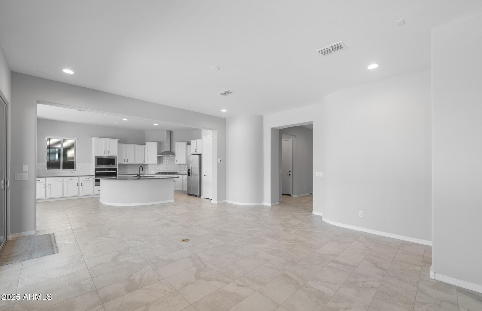 7906 West Mockingbird Way Florence, AZ 85132 - Photo 8 of 36 a view of kitchen with refrigerator and window