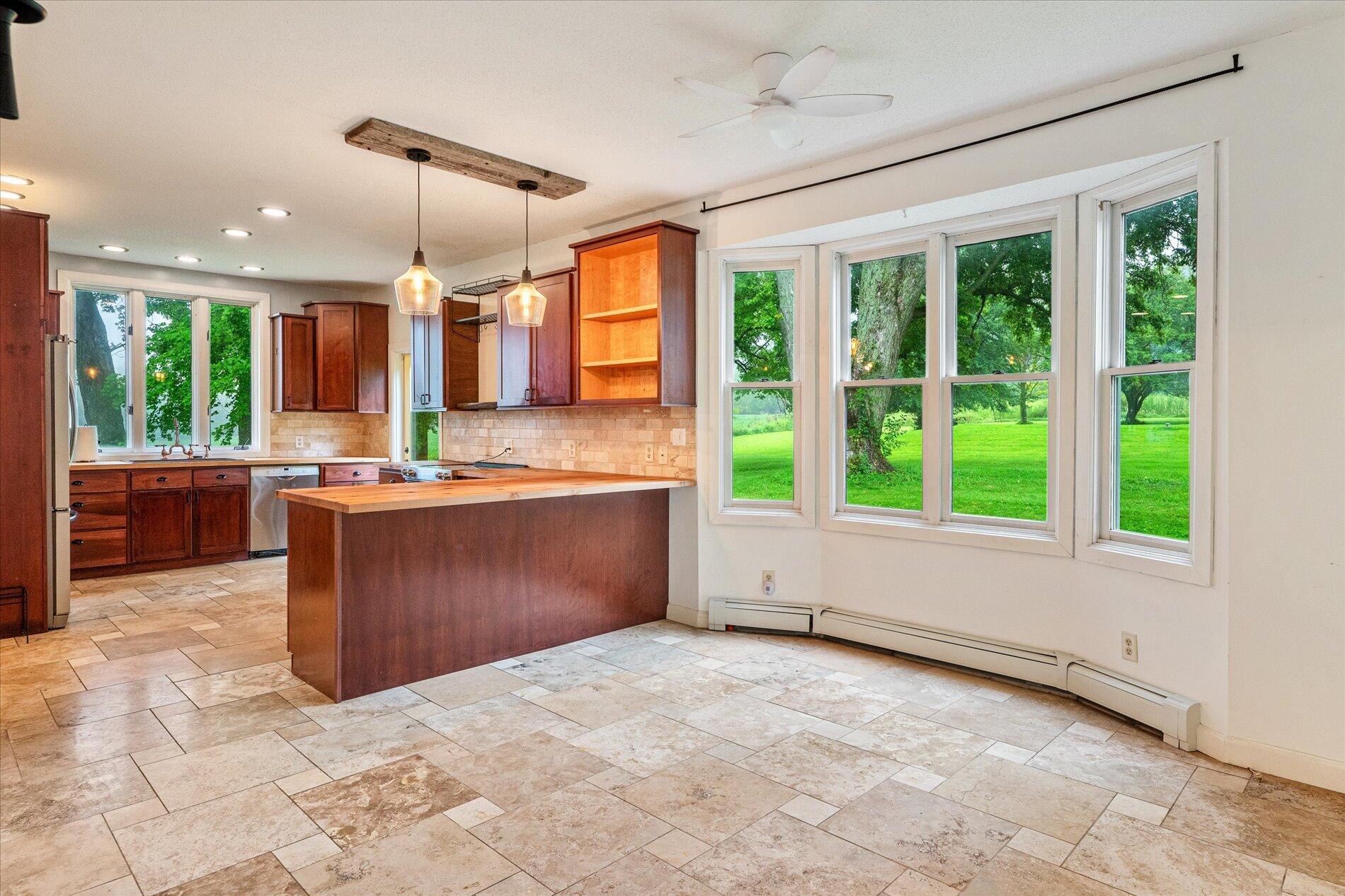 E7530 Hinkst Hollow Road Franklin, WI 54665 - Photo 10 of 45 Breakfast Nook to Kitchen