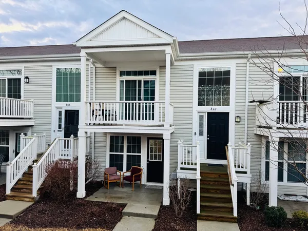 a front view of a house with a porch
