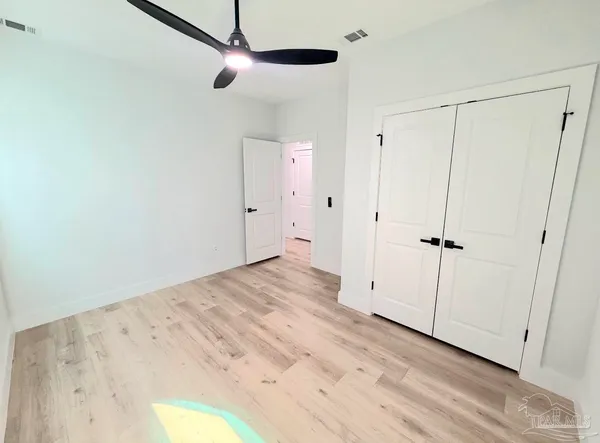 a view of a room with an empty space