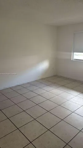 a view of a room and window