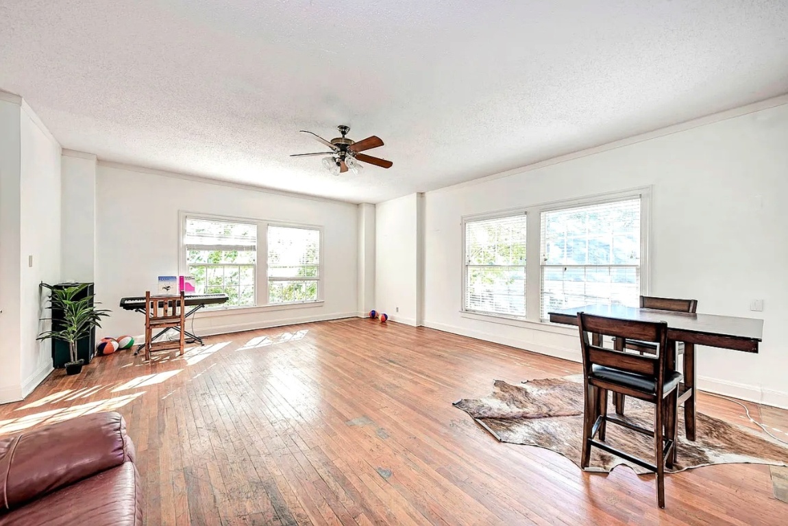 1919 Robbins Place Austin, TX 78705 - Photo 15 of 28 a living room with furniture and a window