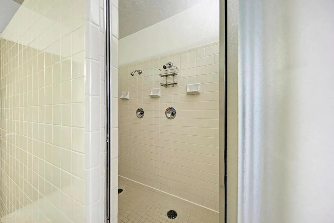 1919 Robbins Place Austin, TX 78705 - Photo 24 of 28 a bathroom with a shower