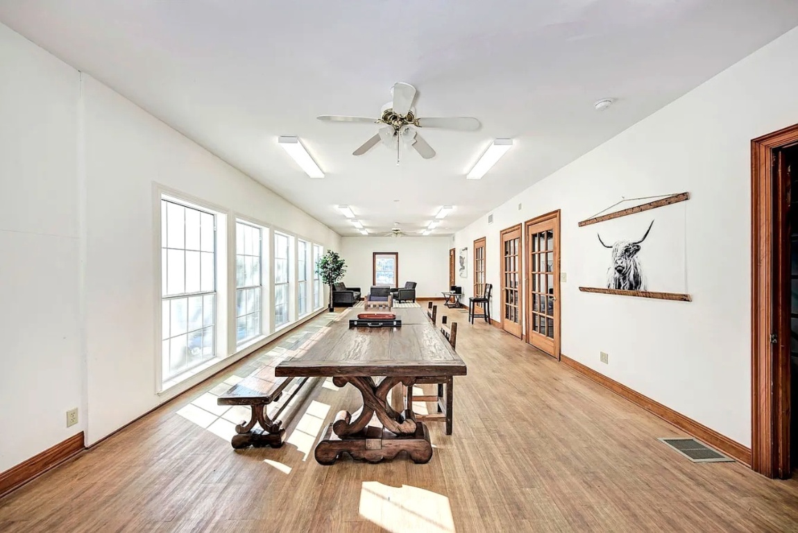 1919 Robbins Place Austin, TX 78705 - Photo 9 of 28 a view of a dining room with furniture window and wooden floor