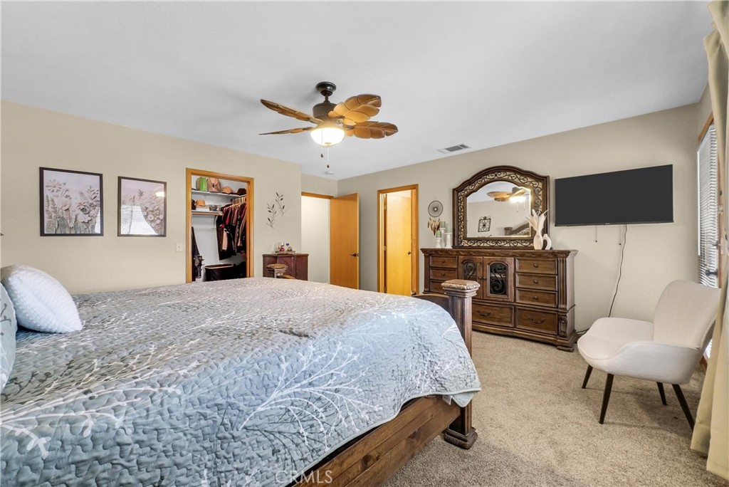 13931 Falling Leaf Road Apple Valley, CA 92307 - Photo 14 of 50 Side view of Primary Bedroom