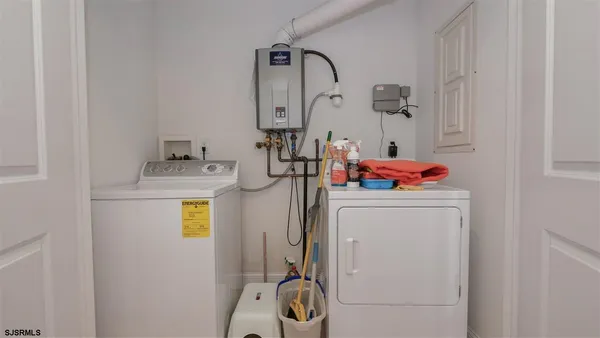 a utility room with dryer and washer