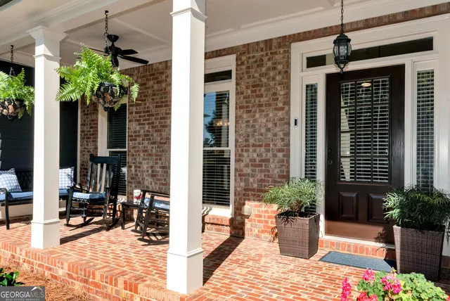a kitchen with granite countertop a sink and cabinets