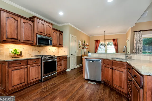 a room with furniture and a flat screen tv