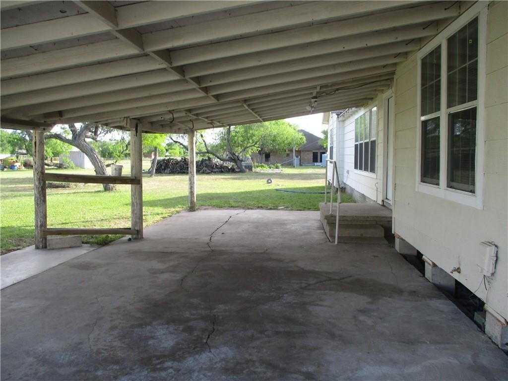 4110 Callicoatte Road Corpus Christi, TX 78410 - Photo 14 of 16 a view of a house with backyard and porch