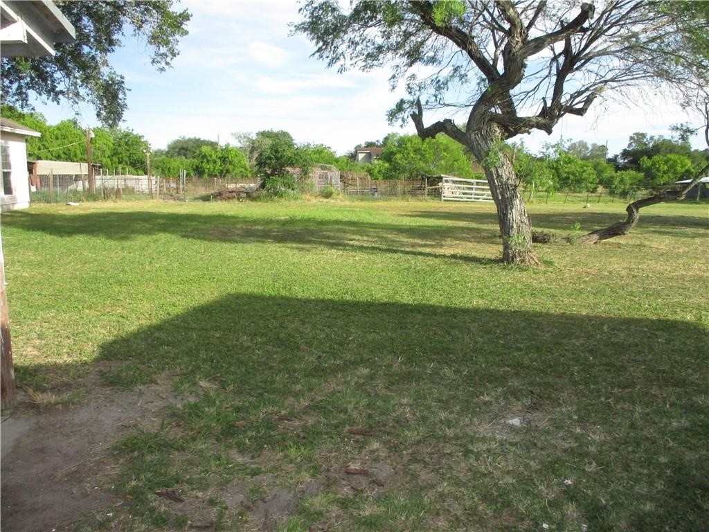 4110 Callicoatte Road Corpus Christi, TX 78410 - Photo 15 of 16 a view of a field with a tree