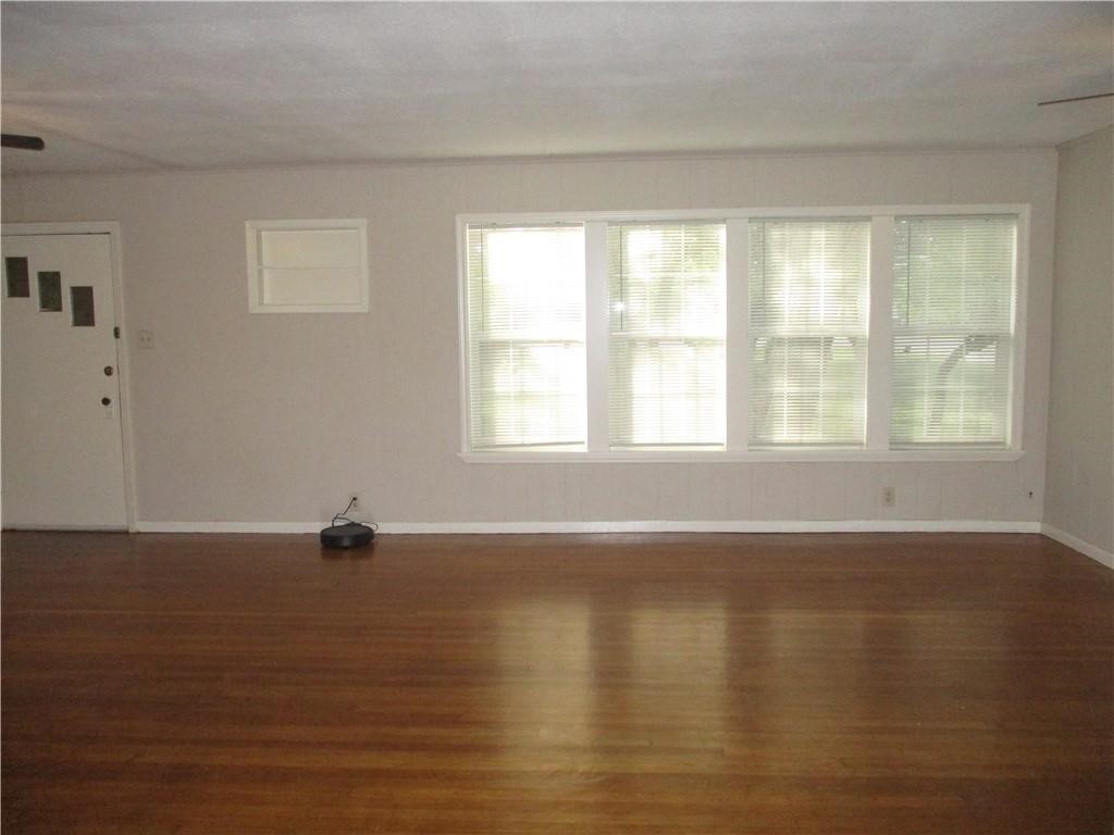 4110 Callicoatte Road Corpus Christi, TX 78410 - Photo 2 of 16 a view of an empty room with a window