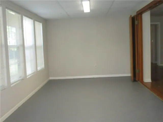 an empty room with windows