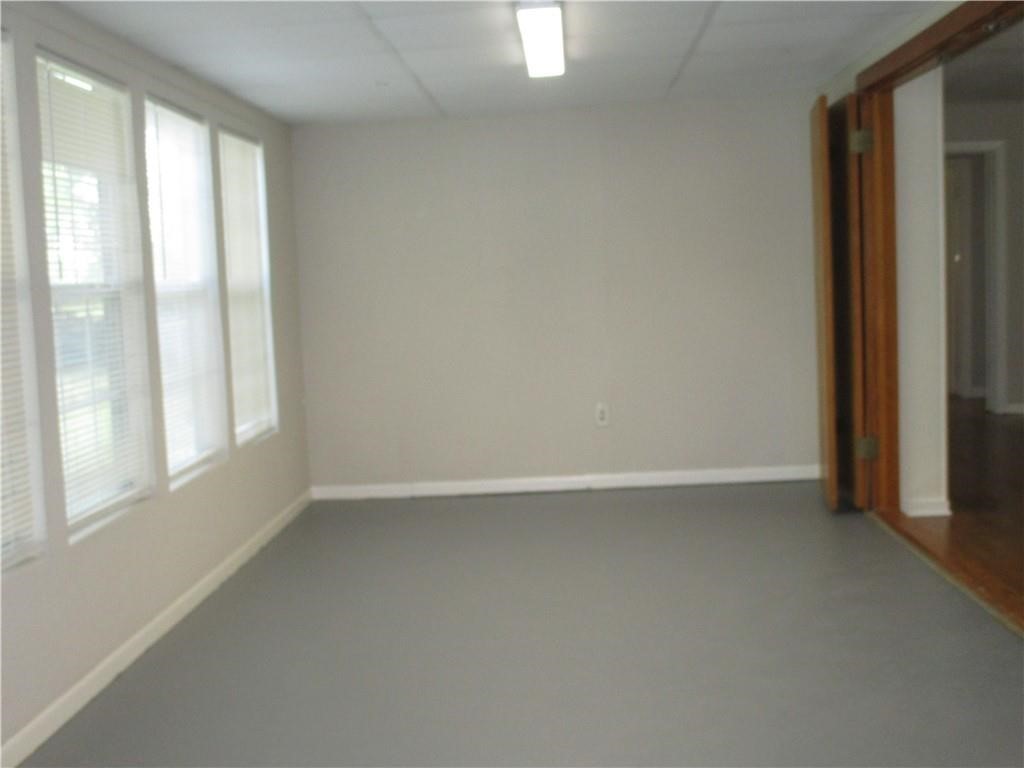 4110 Callicoatte Road Corpus Christi, TX 78410 - Photo 5 of 16 an empty room with windows