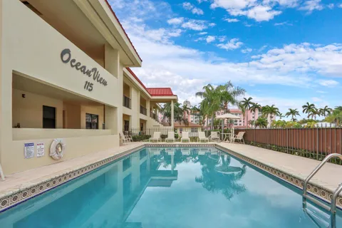 a view of a swimming pool with a terrace
