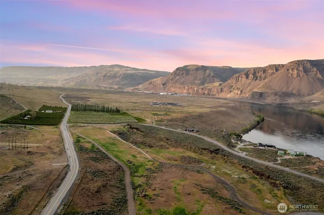 a view of a dry yard with mountain
