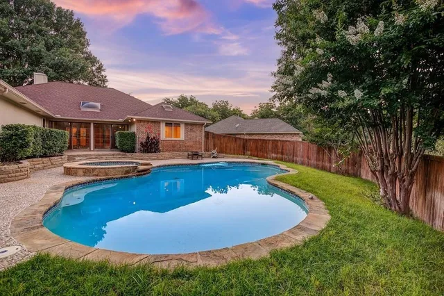 a view of a house with swimming pool