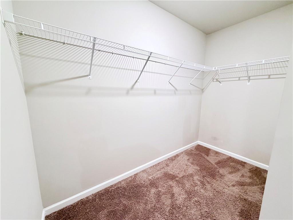 4749 Rdg Vly Drive Gainesville, GA 30504 - Photo 13 of 24 a view of a room with racks on the wall