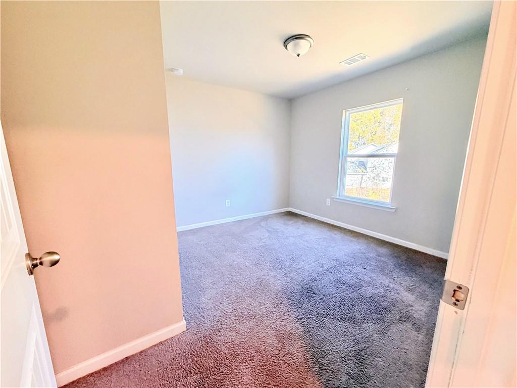 4749 Rdg Vly Drive Gainesville, GA 30504 - Photo 14 of 24 an empty room with windows