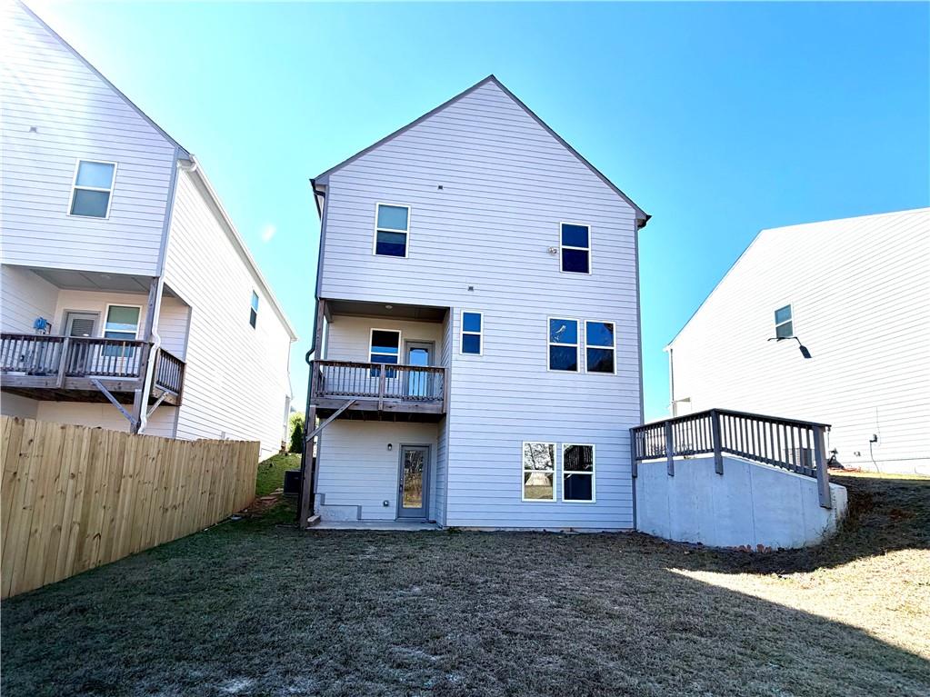 4749 Rdg Vly Drive Gainesville, GA 30504 - Photo 19 of 24 a view of a house with a backyard