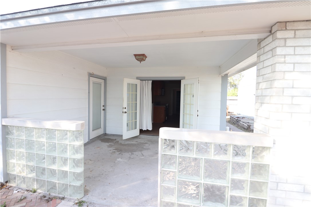 901 Strom Road Corpus Christi, TX 78418 - Photo 16 of 19 a view of a bathroom with a sink and a mirror