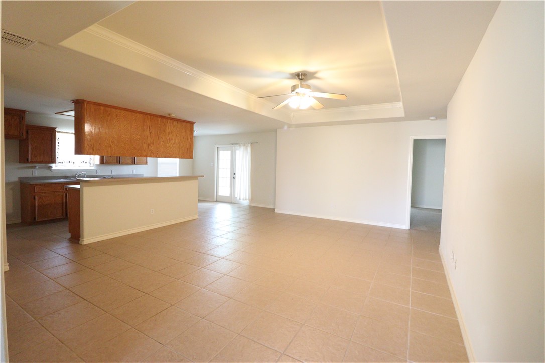 901 Strom Road Corpus Christi, TX 78418 - Photo 4 of 19 a view of a kitchen with a sink cabinets and a window