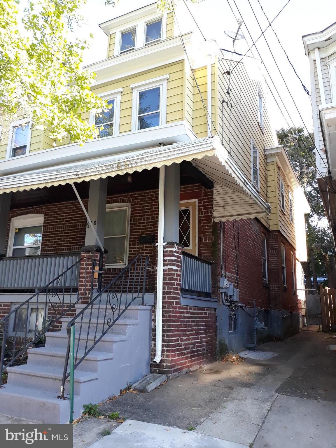 676 Rutherford Avenue Trenton, NJ 08618 - Photo 2 of 15 Front from another angle and path to back yard.