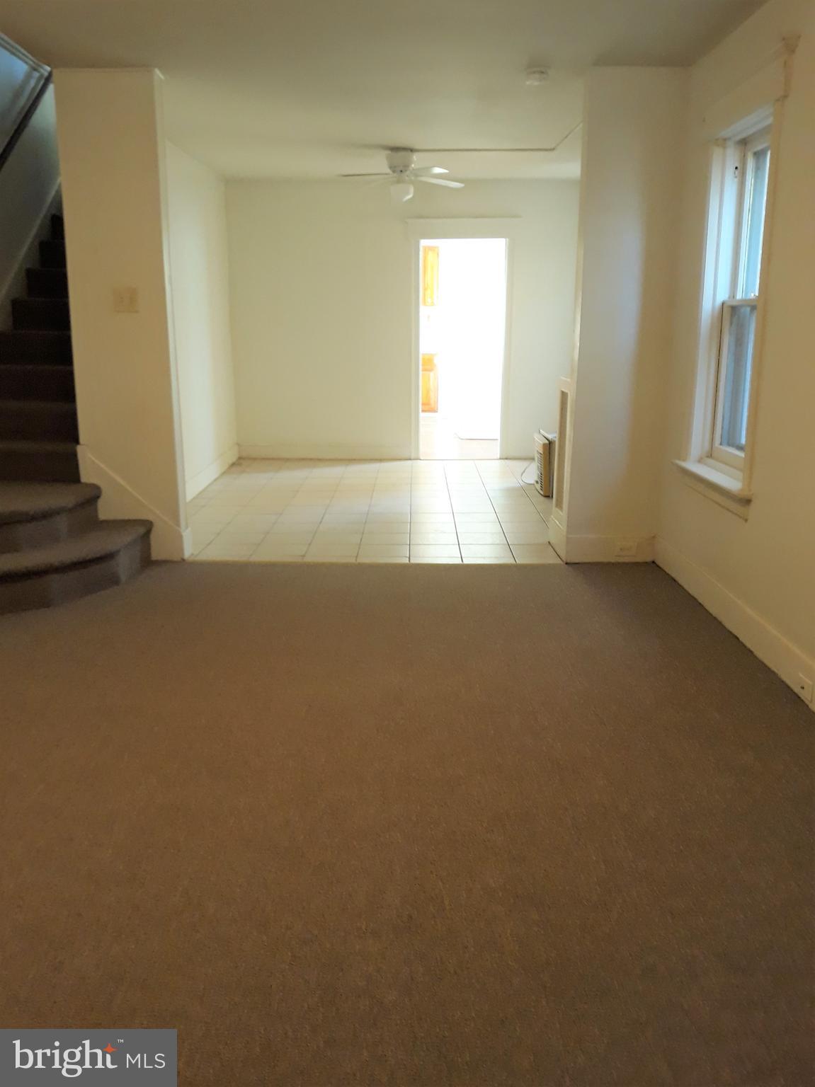 676 Rutherford Avenue Trenton, NJ 08618 - Photo 4 of 15 Living Room through to the dining room.