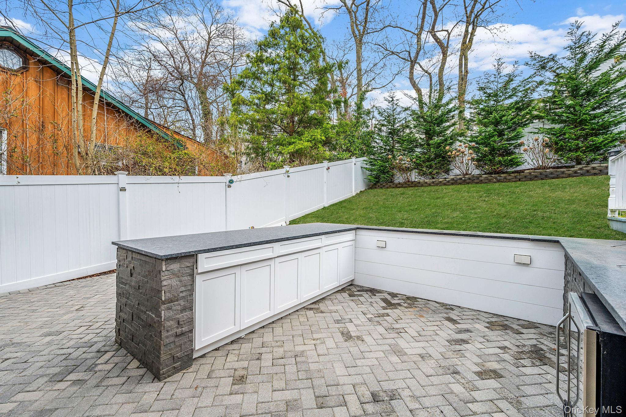 38 Hawthorne Road Rocky Point, NY 11778 - Photo 5 of 27 a view of backyard with outdoor seating and green space