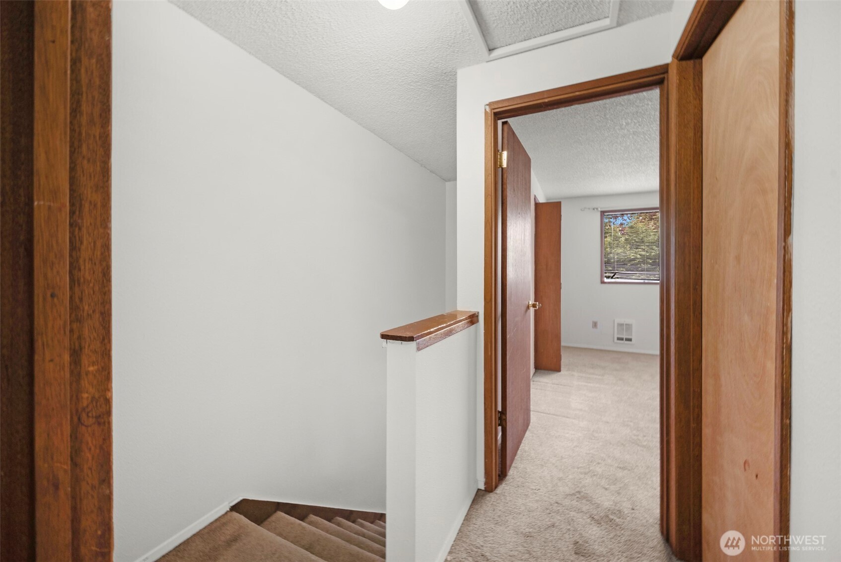 6920 Armar Road Marysville, WA 98270 - Photo 15 of 24 a view of a bathroom from a hallway