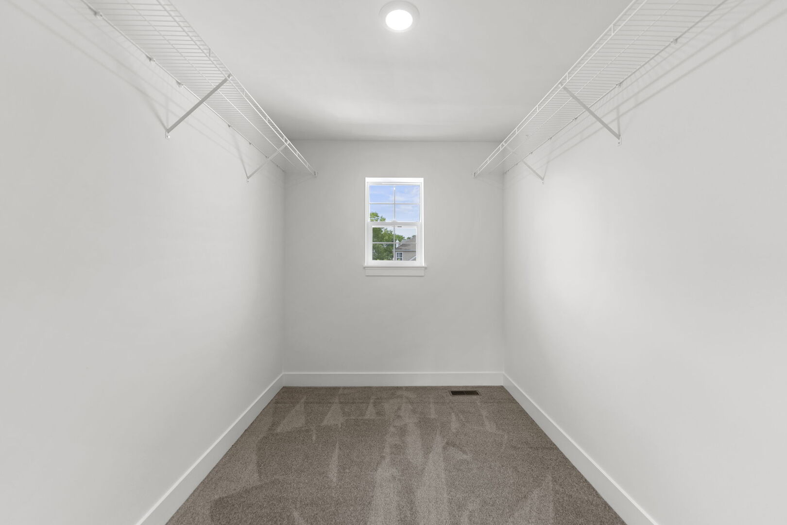 715 Fox Trail Terrace Cary, IL 60013 - Photo 13 of 22 an empty room with a window