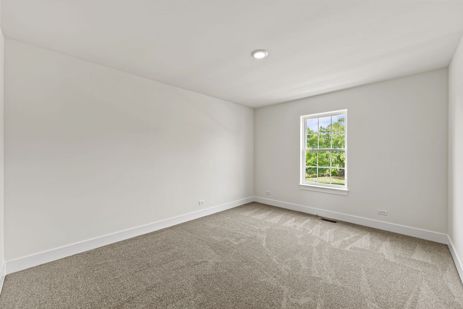 715 Fox Trail Terrace Cary, IL 60013 - Photo 14 of 22 an empty room with a window