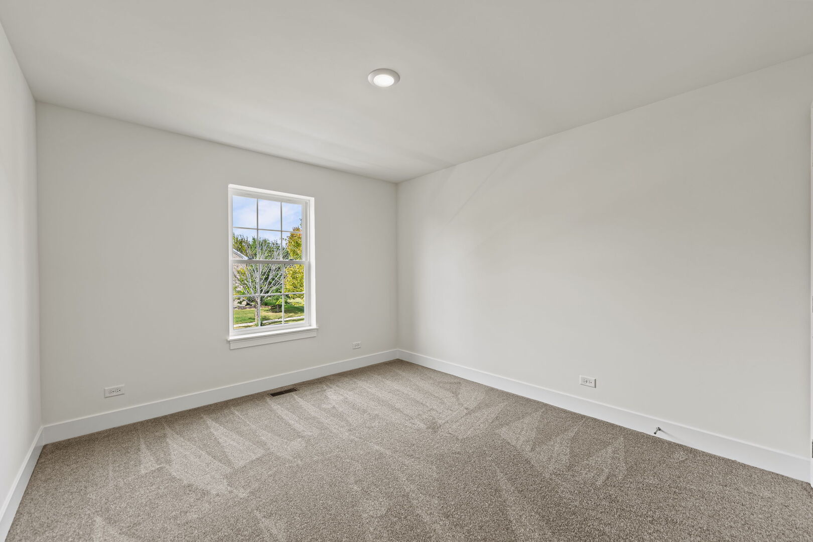 715 Fox Trail Terrace Cary, IL 60013 - Photo 15 of 22 an empty room with a window
