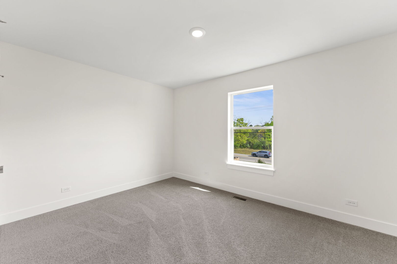 715 Fox Trail Terrace Cary, IL 60013 - Photo 16 of 22 an empty room with a window