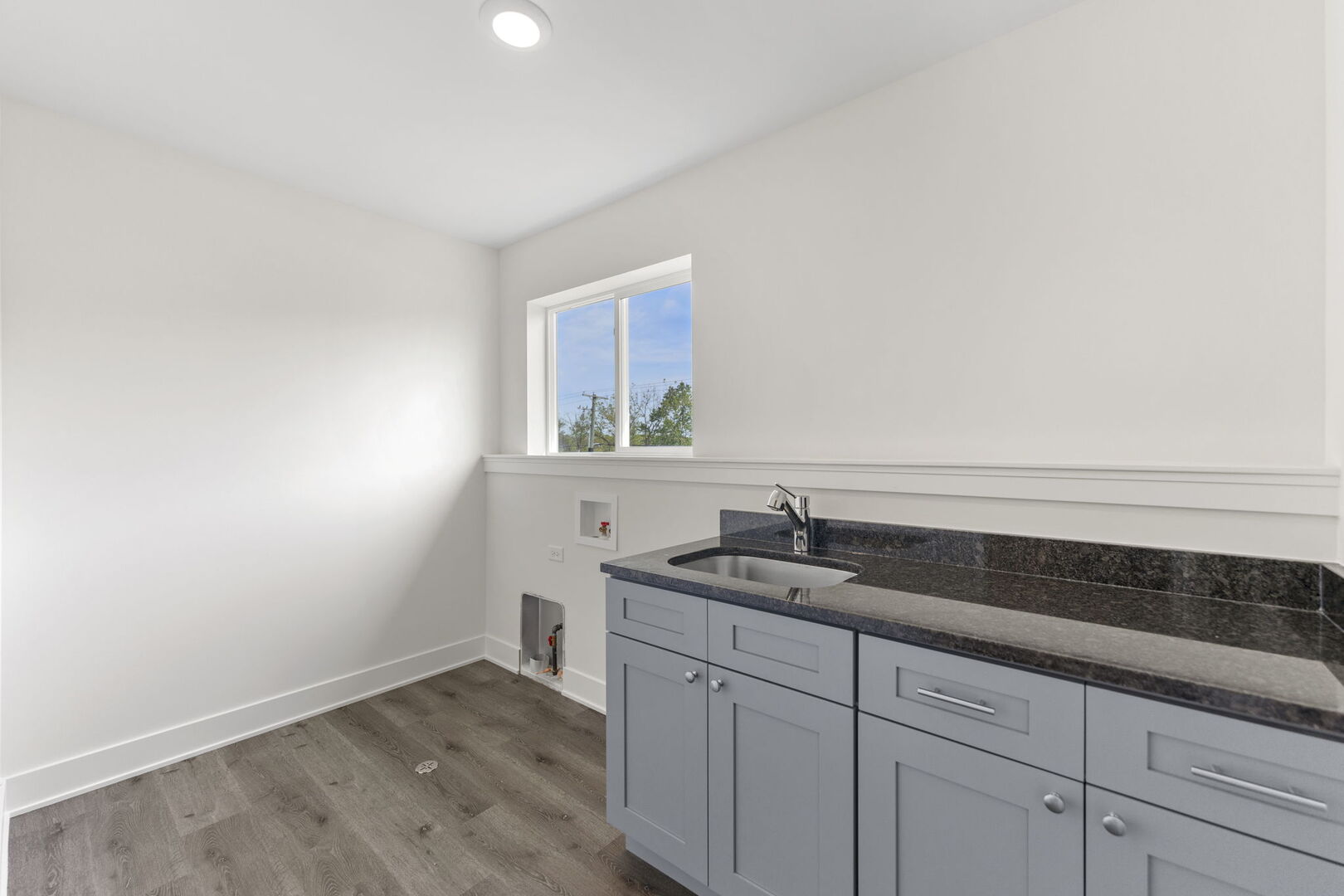 715 Fox Trail Terrace Cary, IL 60013 - Photo 17 of 22 a kitchen with a sink and cabinets