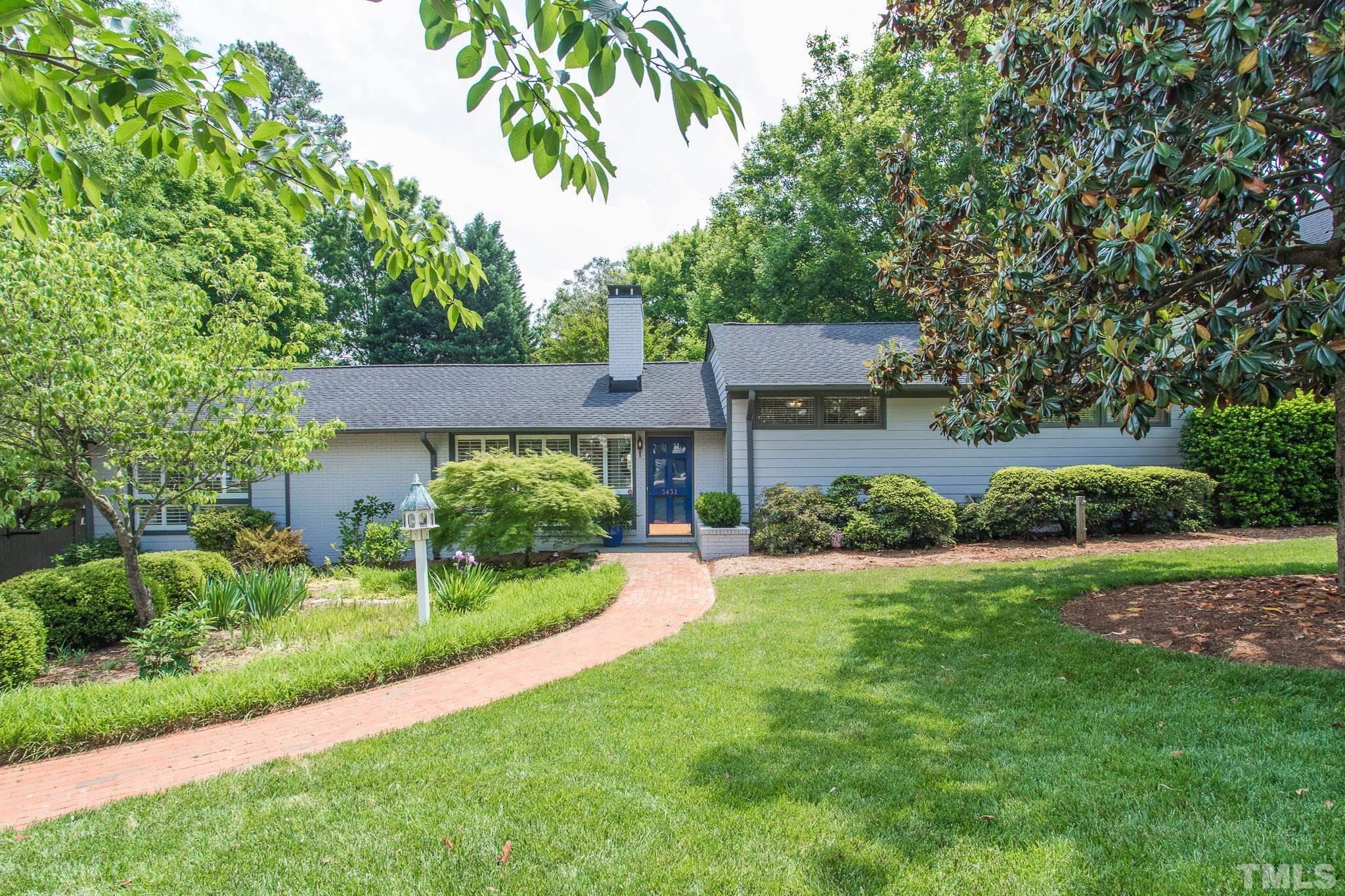 3431 Churchill Road Raleigh, NC 27607 - Photo 1 of 47 a front view of house with yard and green space