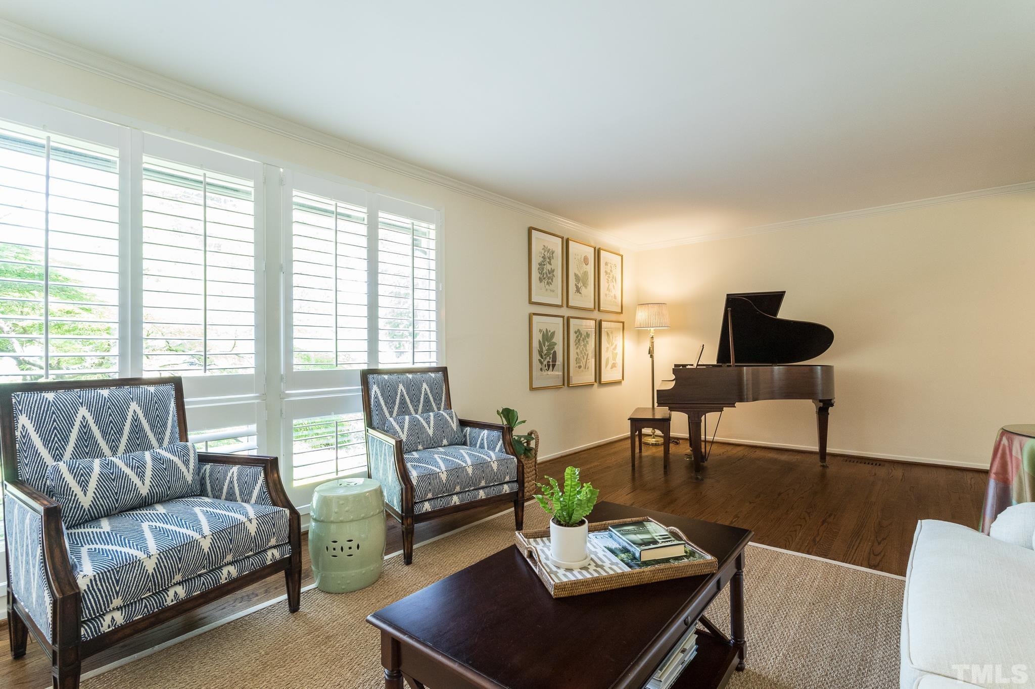 3431 Churchill Road Raleigh, NC 27607 - Photo 17 of 47 a living room with furniture and a window