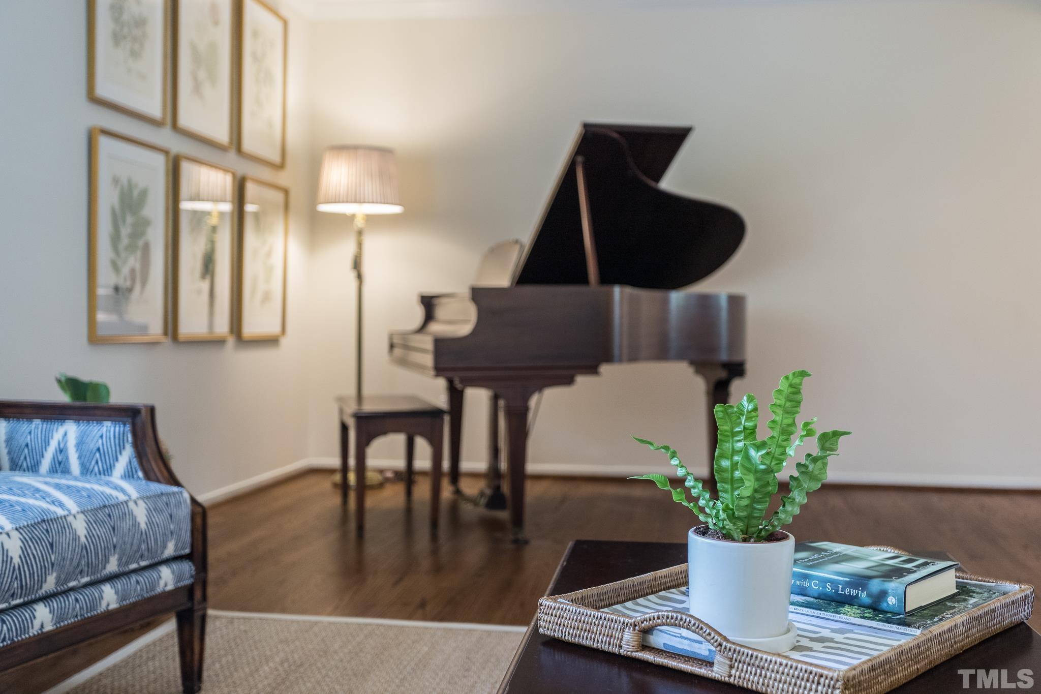 3431 Churchill Road Raleigh, NC 27607 - Photo 20 of 47 a vase of flowers sitting on a table