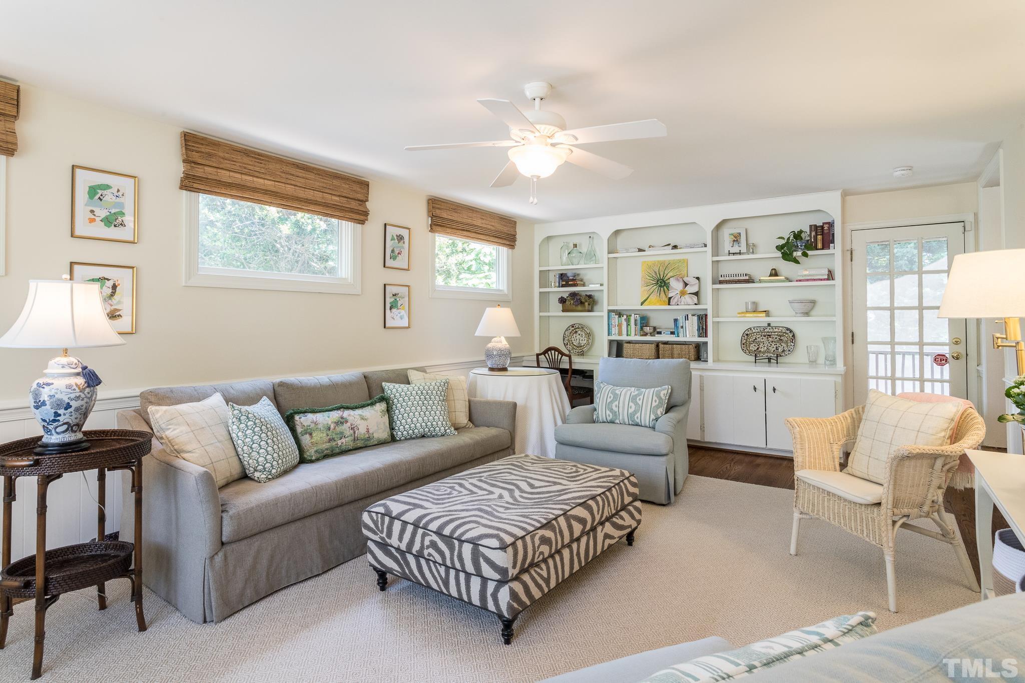 3431 Churchill Road Raleigh, NC 27607 - Photo 27 of 47 a living room with furniture and a large window