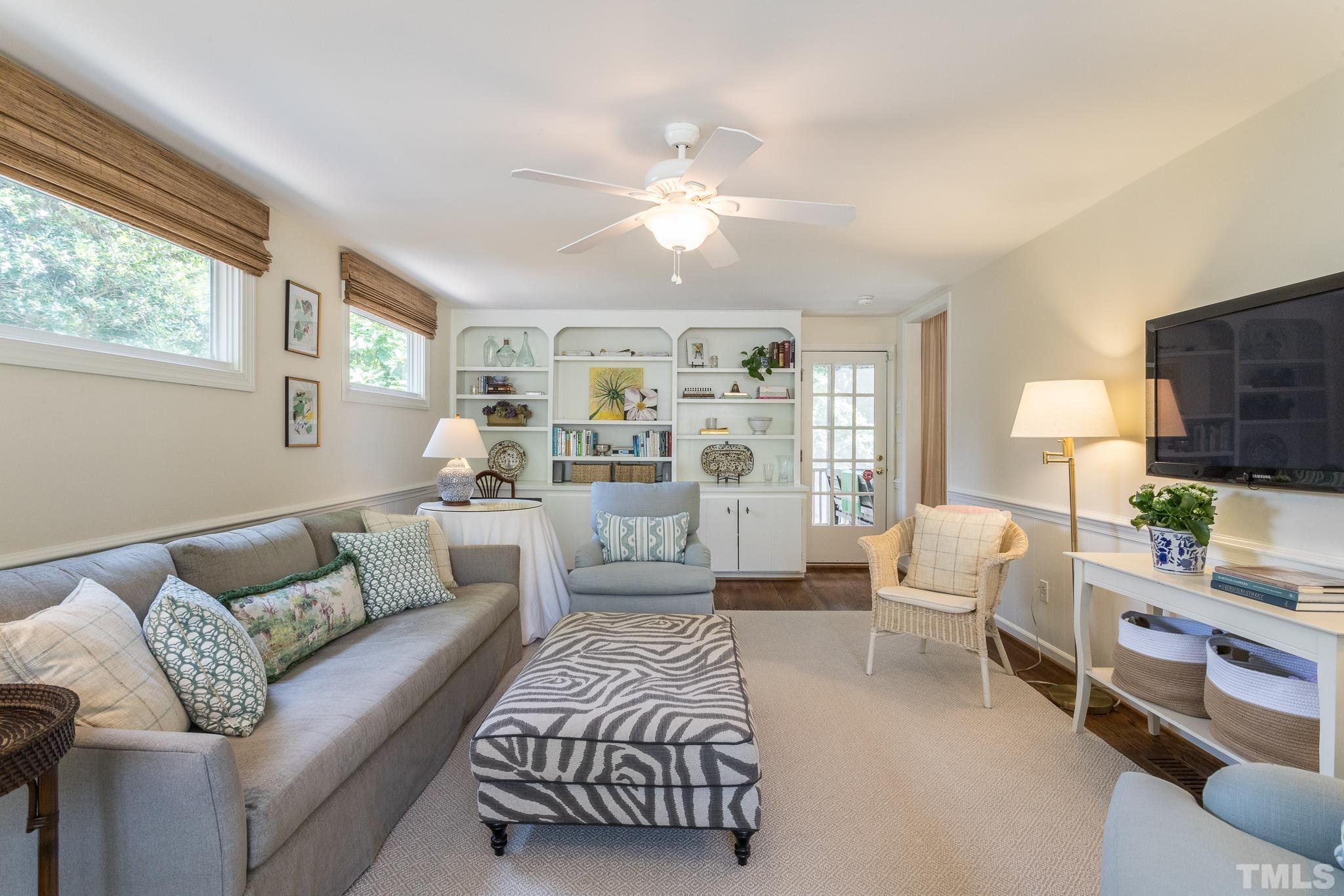 3431 Churchill Road Raleigh, NC 27607 - Photo 29 of 47 a living room with furniture and a large window