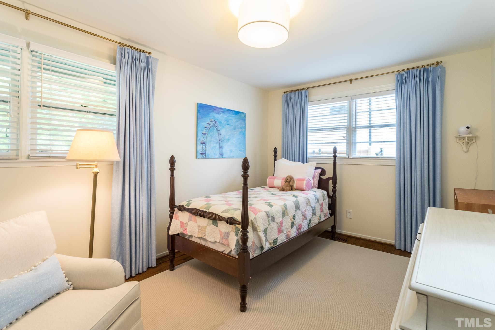 3431 Churchill Road Raleigh, NC 27607 - Photo 41 of 47 a bed room with a bed and a window