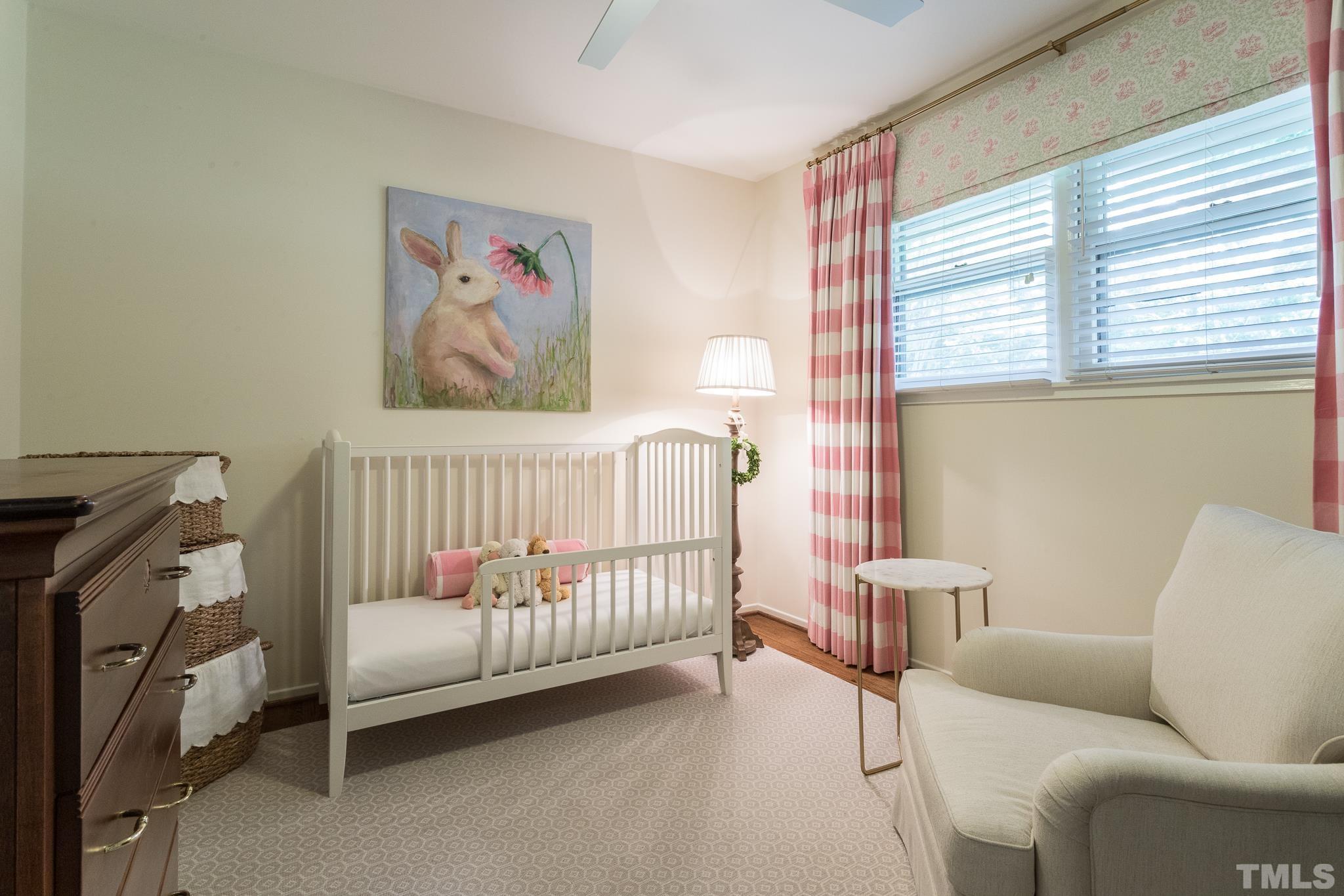 3431 Churchill Road Raleigh, NC 27607 - Photo 42 of 47 a bedroom with furniture and a window