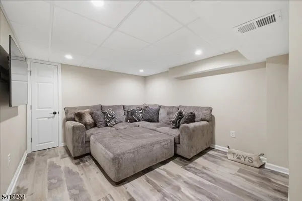 a large room with a bed and a couch