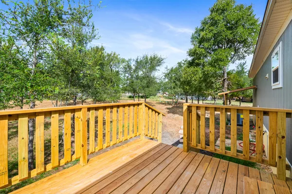 a view of deck with a flat screen tv
