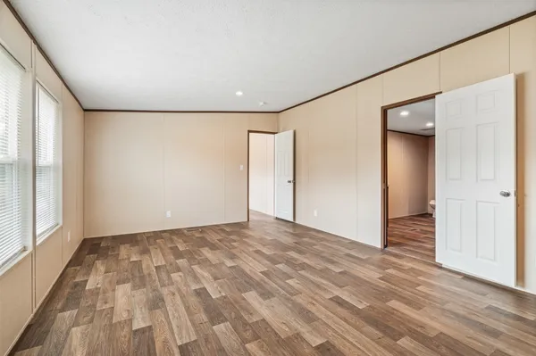 a view of an empty room and window
