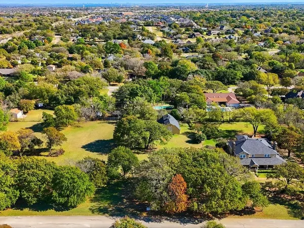 an aerial view of residential house with parking space