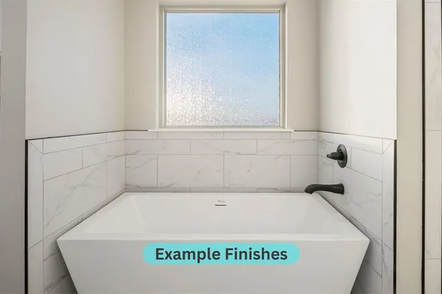 view of a bath tub sitting in a bathroom