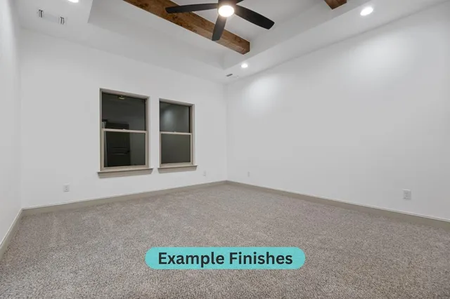 an empty room with a ceiling fan