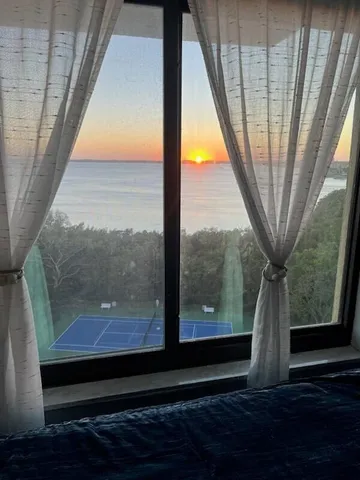 a view of swimming pool from a window