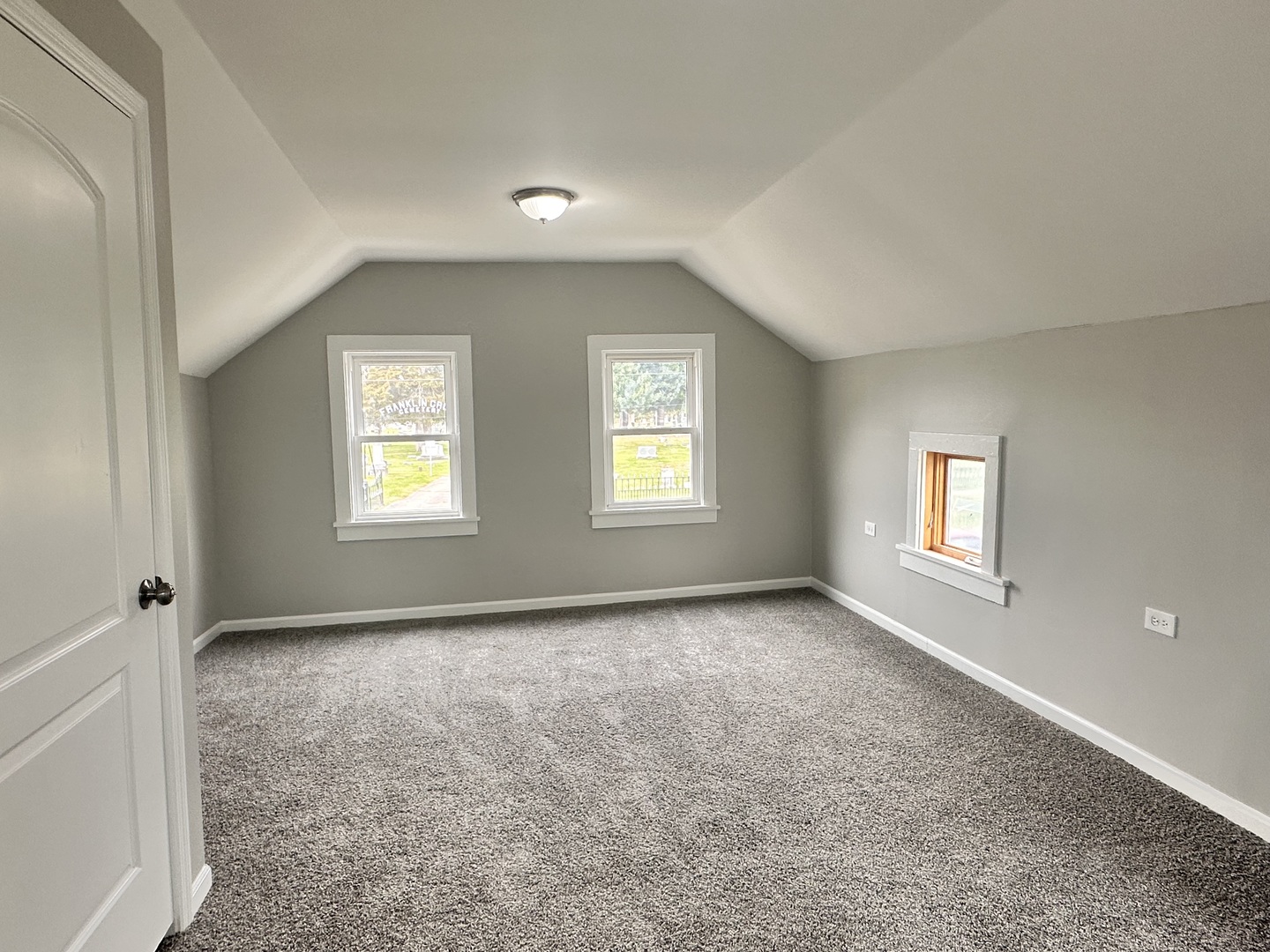 248 North State Street Franklin Grove, IL 61031 - Photo 21 of 26 an empty room with windows